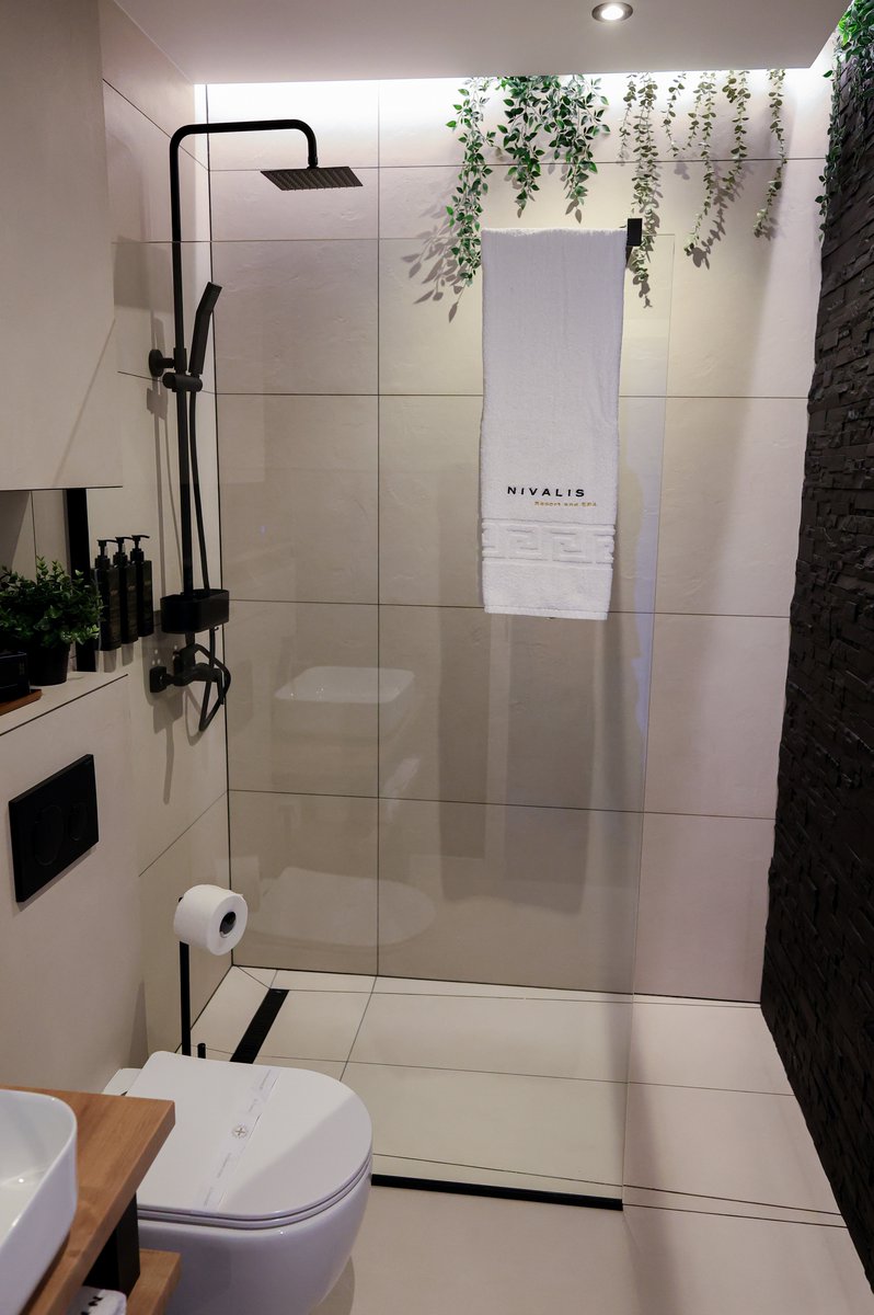 Modern shower bathroom at Nivalis Resort & SPA