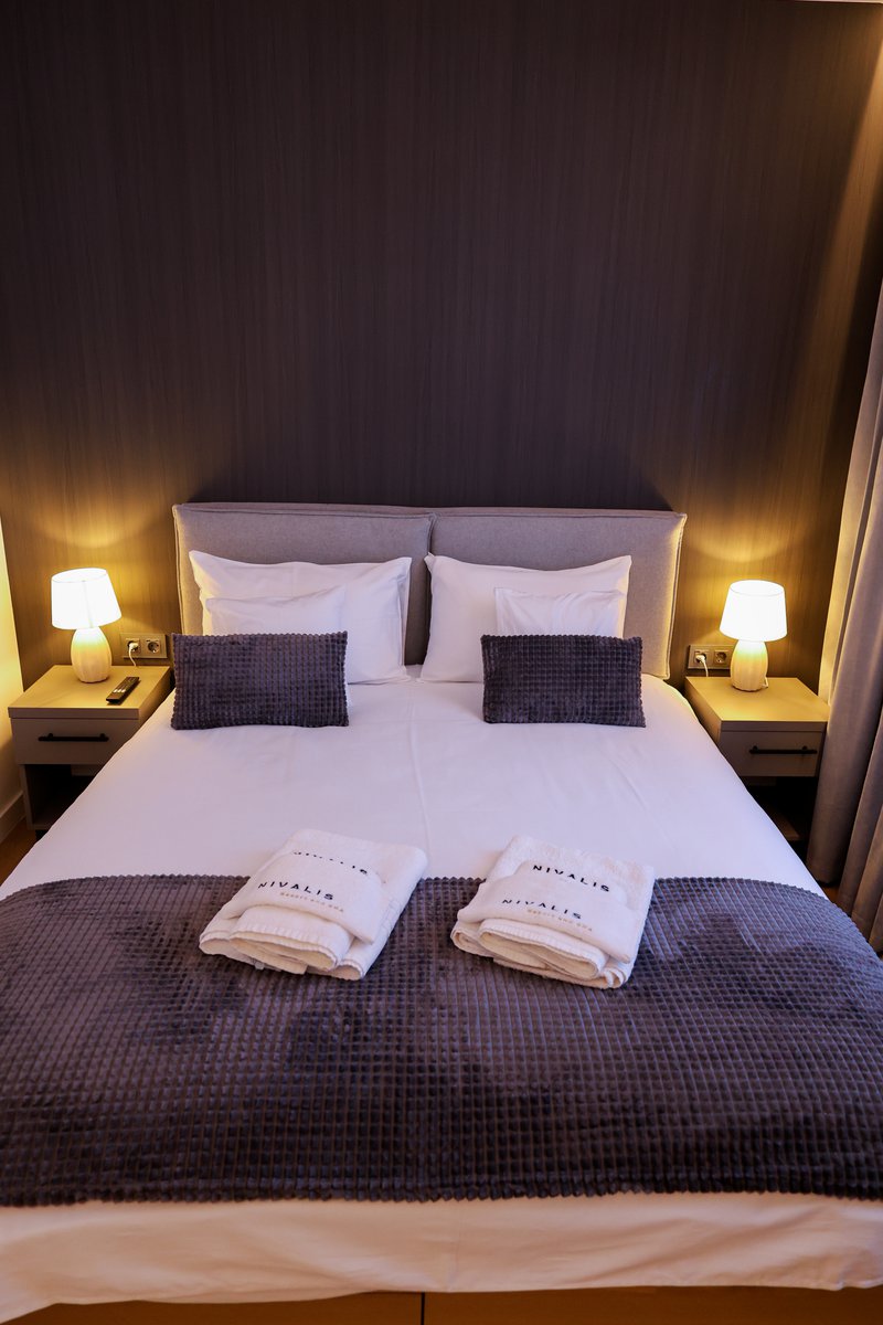 Bedroom at Nivalis Resort & SPA chalet