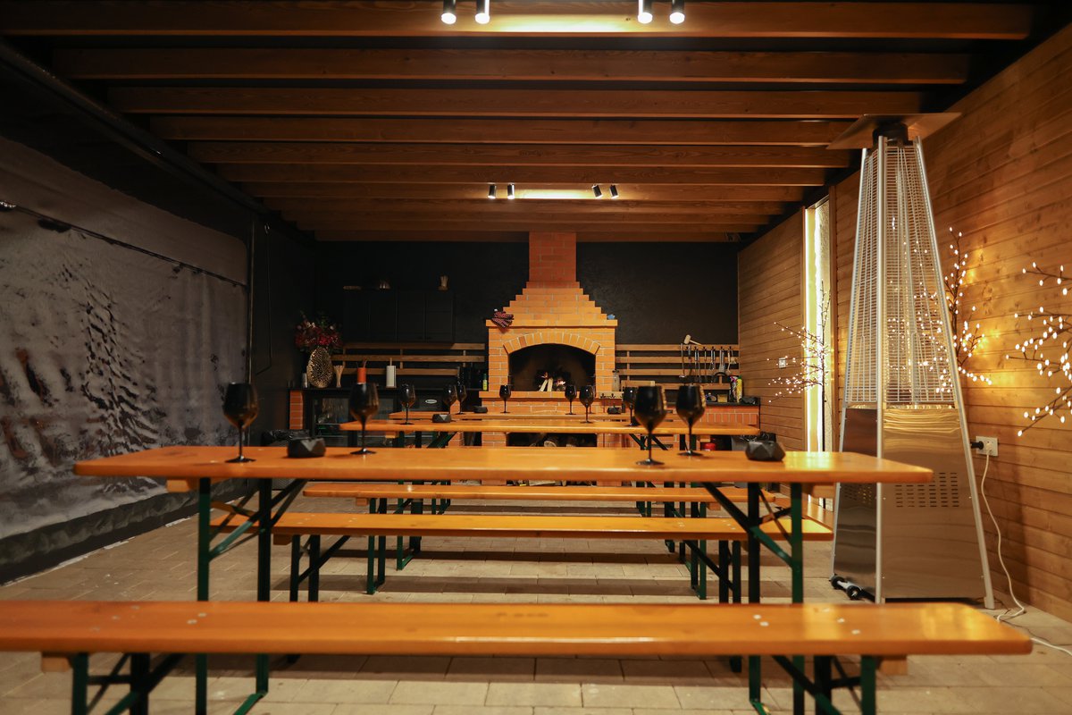 Zonă de adunare și grătar în aer liber la Nivalis Resort